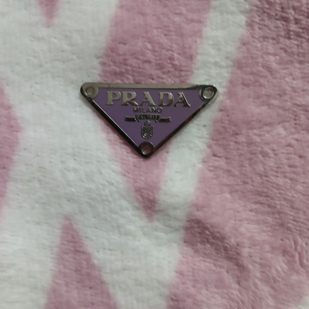 Prada Purple and Silver Triangular Logo Plaque.